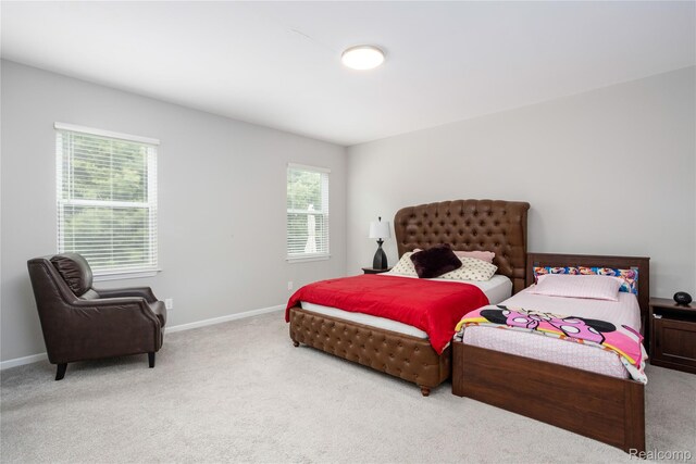 132 Copper Ridge Ct, Walled Lake, MI 48390 - carpeted bedroom with baseboards