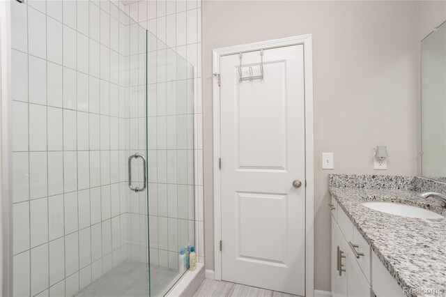 132 Copper Ridge Ct, Walled Lake, MI 48390 - full bathroom featuring vanity and a shower stall
