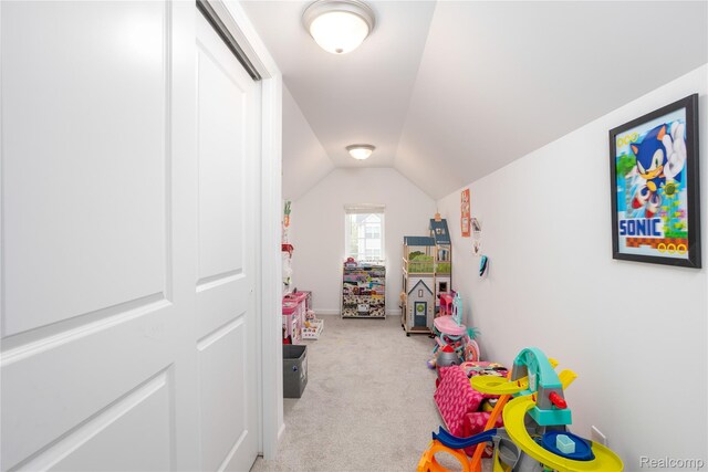 132 Copper Ridge Ct, Walled Lake, MI 48390 - game room with carpet and lofted ceiling