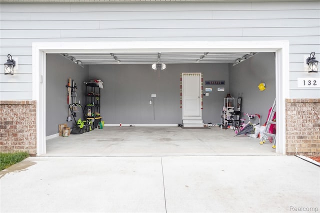 132 Copper Ridge Ct, Walled Lake, MI 48390 - garage with a garage door opener