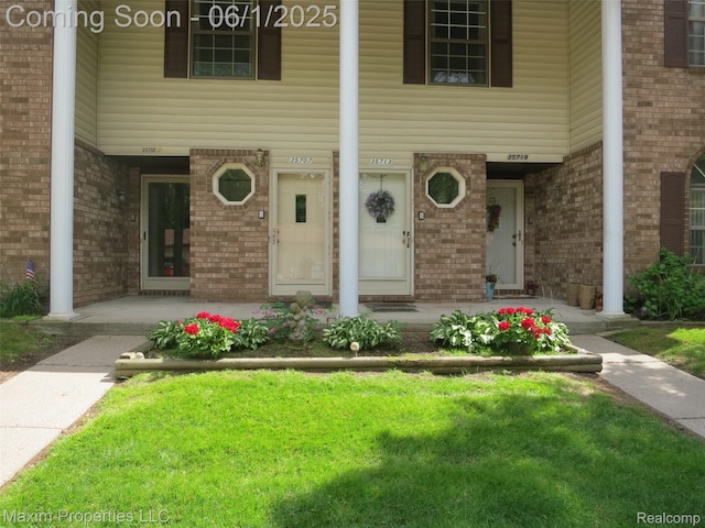 35707 Hunter Ave Unit 8, Westland, MI 48185 - entrance to property featuring covered porch and brick siding