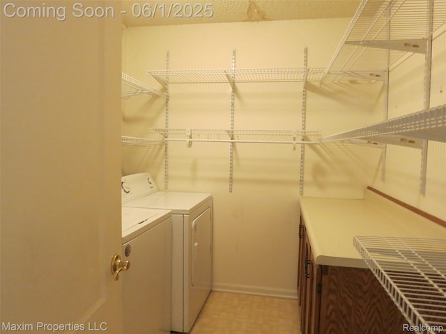 35707 Hunter Ave Unit 8, Westland, MI 48185 - laundry room featuring washing machine and dryer, baseboards, and light floors