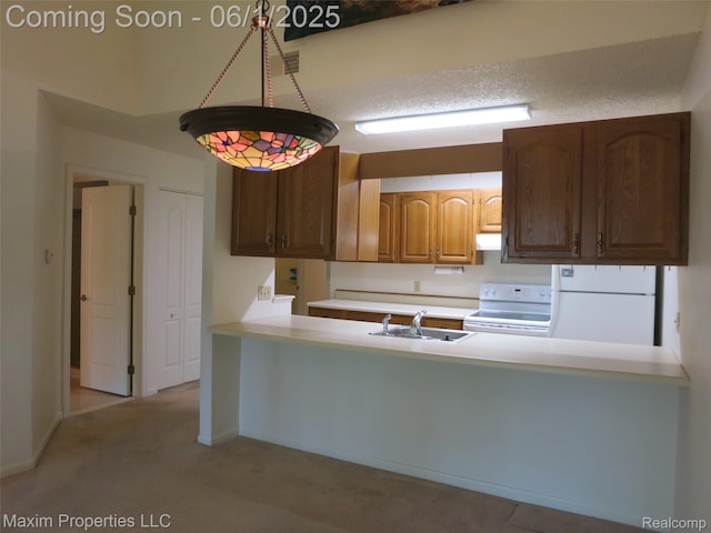 35707 Hunter Ave Unit 8, Westland, MI 48185 - kitchen with white appliances, a sink, light countertops, and light carpet