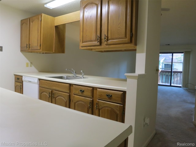 35707 Hunter Ave Unit 8, Westland, MI 48185 - kitchen with dishwasher, dark colored carpet, light countertops, and brown cabinetry