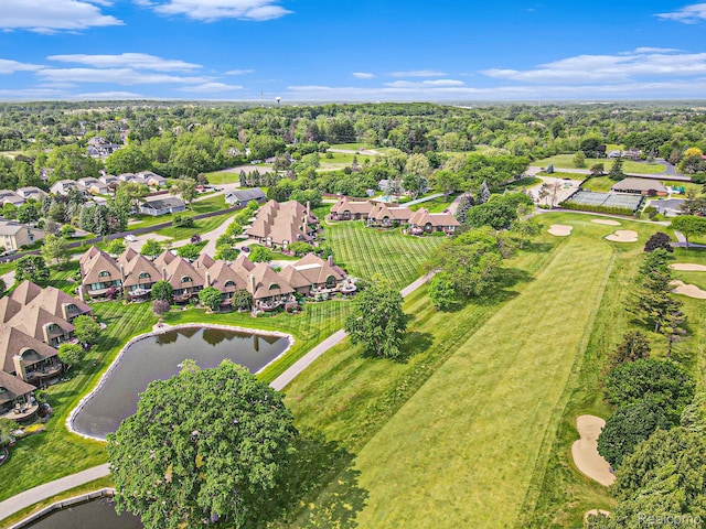 9095 S Saginaw Rd Unit 10, Grand Blanc, MI 48439 - aerial perspective of suburban area with a large body of water and a tree filled landscape