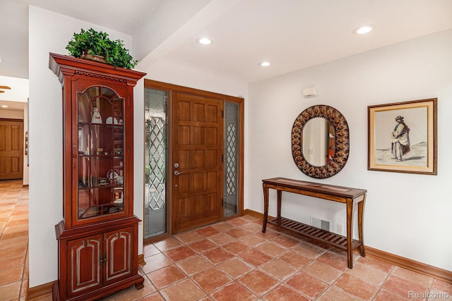 9095 S Saginaw Rd Unit 10, Grand Blanc, MI 48439 - foyer with baseboards and recessed lighting