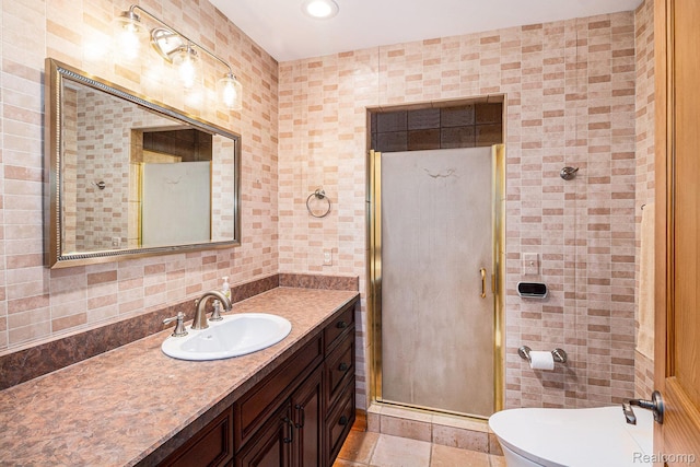 9095 S Saginaw Rd Unit 10, Grand Blanc, MI 48439 - bathroom with tile walls, vanity, a shower stall, recessed lighting, and toilet