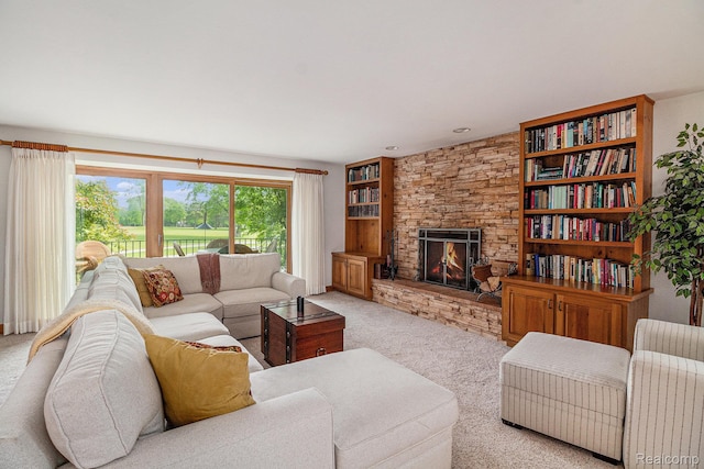 9095 S Saginaw Rd Unit 10, Grand Blanc, MI 48439 - living room featuring light carpet and a fireplace