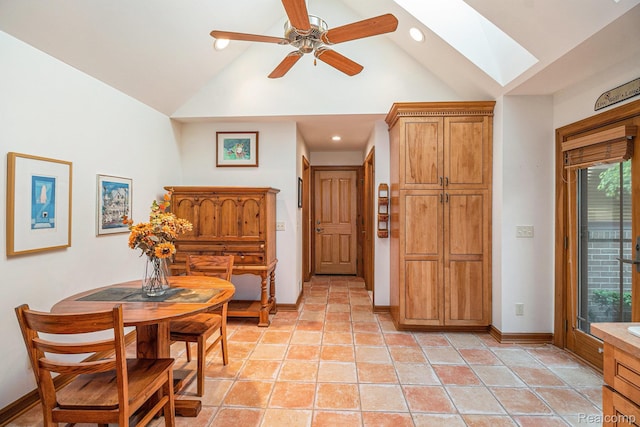 9095 S Saginaw Rd Unit 10, Grand Blanc, MI 48439 - dining space with a skylight, vaulted ceiling, baseboards, ceiling fan, and recessed lighting