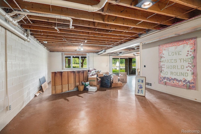 9095 S Saginaw Rd Unit 10, Grand Blanc, MI 48439 - below grade area featuring concrete block wall
