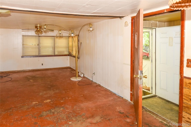 123 Parkdale Ave, Pontiac, MI 48340 - empty room with concrete flooring and wooden walls