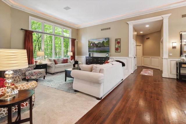 3283 Foxfire Dr, Milford, MI 48380 - living area featuring wood finished floors, ornamental molding, wainscoting, ornate columns, and a decorative wall