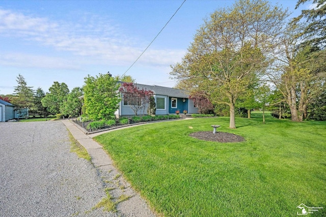 4851 Consear Rd, Ottawa Lake, MI 49267 - view of front of property with a front lawn and gravel driveway
