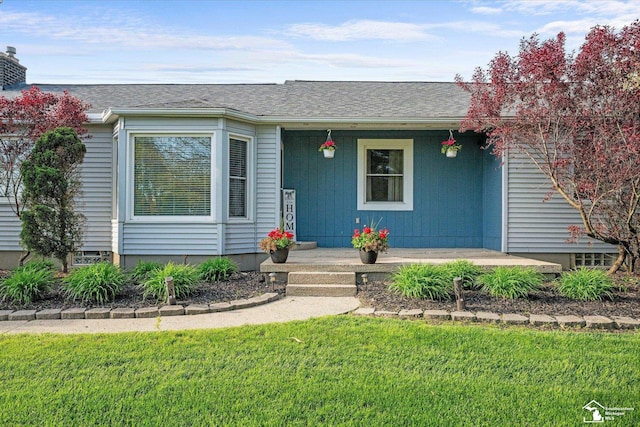 4851 Consear Rd, Ottawa Lake, MI 49267 - view of front of home featuring a porch and a front yard