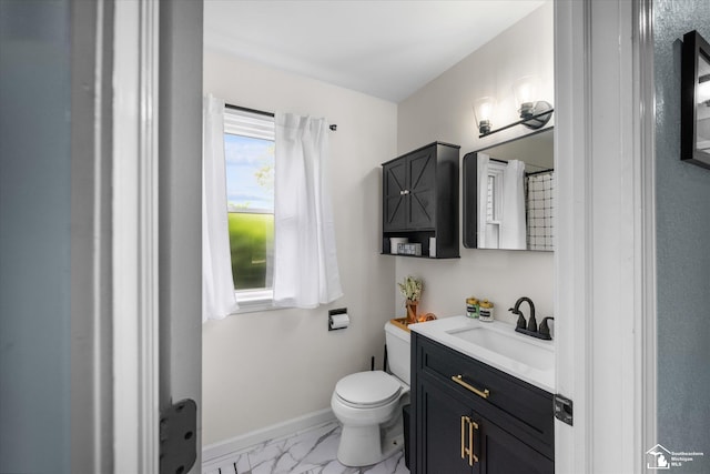 4851 Consear Rd, Ottawa Lake, MI 49267 - full bath featuring vanity, marble finish flooring, toilet, and baseboards