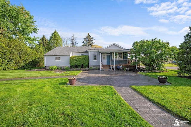 4851 Consear Rd, Ottawa Lake, MI 49267 - view of front of property with covered porch, a front yard, and driveway