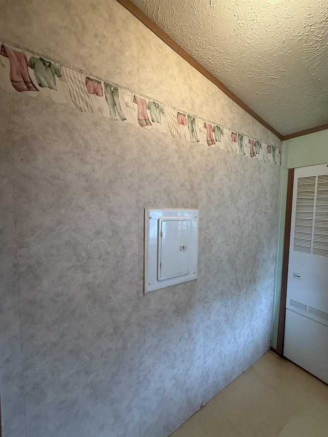 59 Clydesdale Dr, Mount Morris, MI 48458 - detailed view of electric panel, a heating unit, crown molding, and concrete flooring