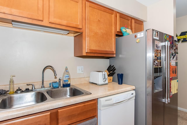 4164 W Centre Ave Unit 103, Portage, MI 49024 - kitchen featuring white dishwasher, a sink, light countertops, stainless steel refrigerator with ice dispenser, and brown cabinetry