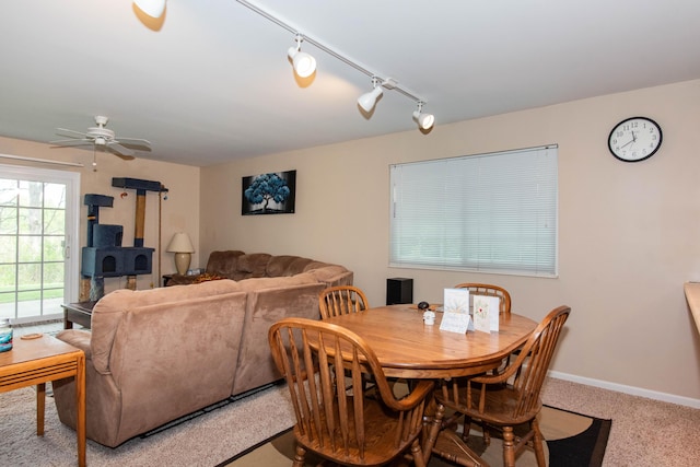 4164 W Centre Ave Unit 103, Portage, MI 49024 - dining room with a ceiling fan, light colored carpet, track lighting, and baseboards