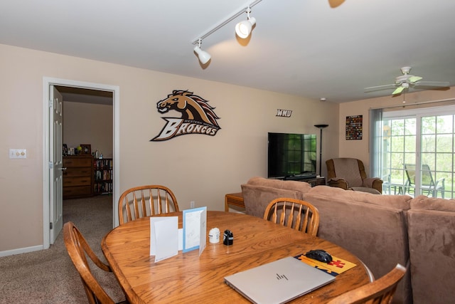 4164 W Centre Ave Unit 103, Portage, MI 49024 - dining room with carpet, ceiling fan, baseboards, and track lighting