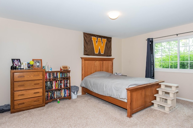 4164 W Centre Ave Unit 103, Portage, MI 49024 - bedroom with light colored carpet and baseboards