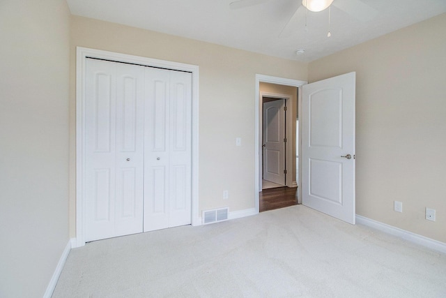 6509 Elle Ave, Portage, MI 49024 - unfurnished bedroom with carpet flooring, baseboards, a closet, and ceiling fan