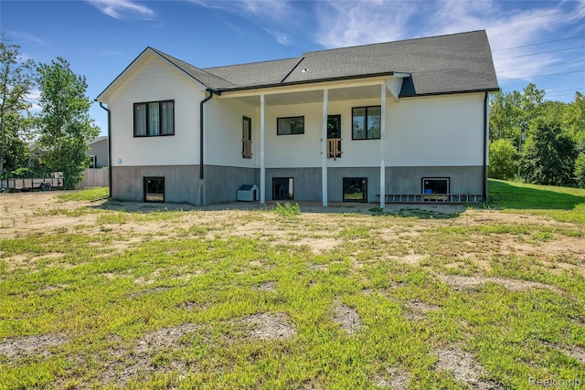 44200 Judd Rd, Belleville, MI 48111 - rear view of house featuring a lawn