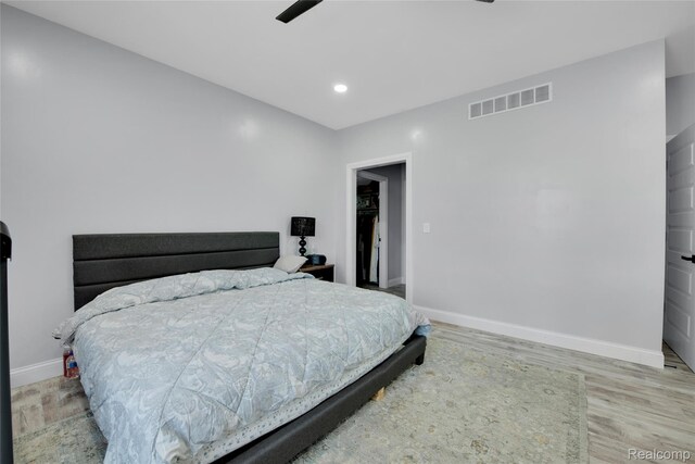 44200 Judd Rd, Belleville, MI 48111 - bedroom with baseboards, wood finished floors, and recessed lighting