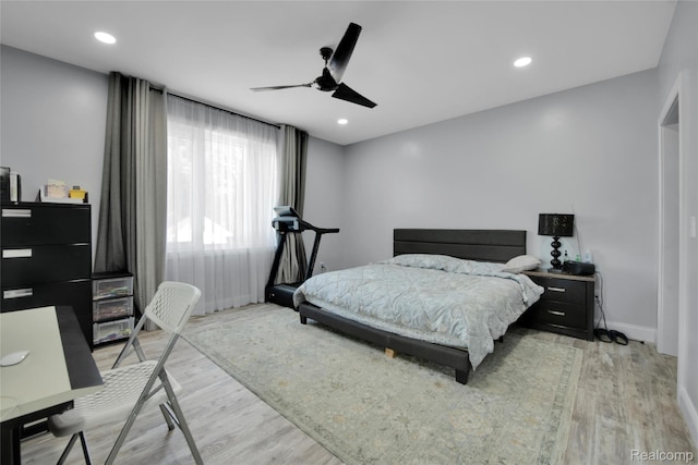44200 Judd Rd, Belleville, MI 48111 - bedroom featuring light wood-style flooring, an office area, baseboards, ceiling fan, and recessed lighting
