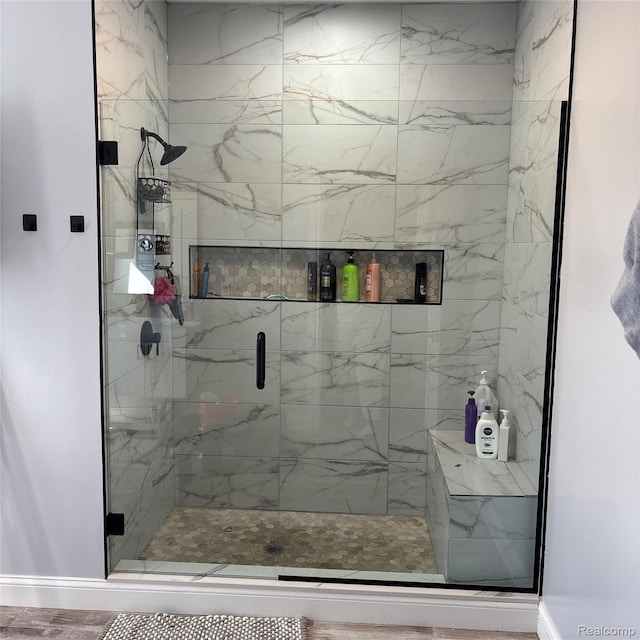 44200 Judd Rd, Belleville, MI 48111 - full bathroom featuring a marble finish shower and baseboards