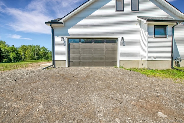 44200 Judd Rd, Belleville, MI 48111 - view of side of home featuring driveway
