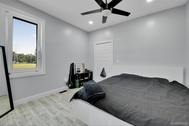 44200 Judd Rd, Belleville, MI 48111 - bedroom with wood finished floors, recessed lighting, baseboards, and ceiling fan
