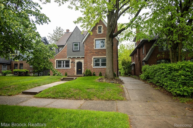 17352 Parkside St, Detroit, MI 48221 - english style home with a front lawn, brick siding, and a chimney