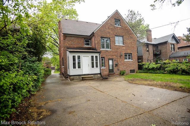 17352 Parkside St, Detroit, MI 48221 - rear view of house featuring entry steps and brick siding