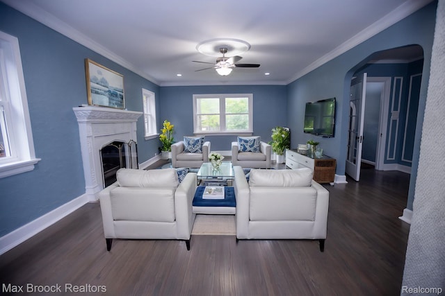 17352 Parkside St, Detroit, MI 48221 - living room featuring arched walkways, wood finished floors, ceiling fan, crown molding, and baseboards
