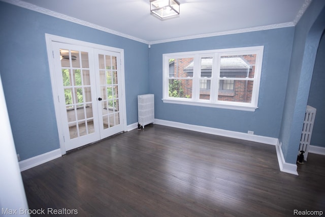 17352 Parkside St, Detroit, MI 48221 - empty room featuring radiator, french doors, dark wood-style flooring, and ornamental molding