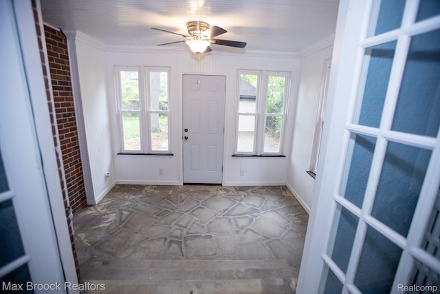 17352 Parkside St, Detroit, MI 48221 - foyer with plenty of natural light, crown molding, ceiling fan, baseboards, and brick wall