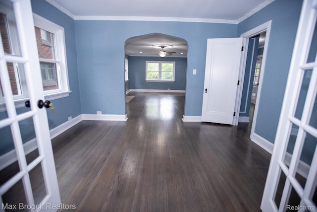 17352 Parkside St, Detroit, MI 48221 - spare room with arched walkways, dark wood finished floors, crown molding, baseboards, and a ceiling fan