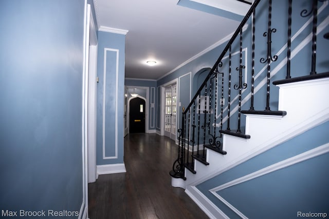 17352 Parkside St, Detroit, MI 48221 - foyer featuring ornamental molding, wood finished floors, stairway, arched walkways, and baseboards