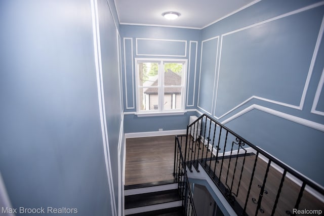 17352 Parkside St, Detroit, MI 48221 - stairway with a decorative wall, crown molding, wood finished floors, and baseboards