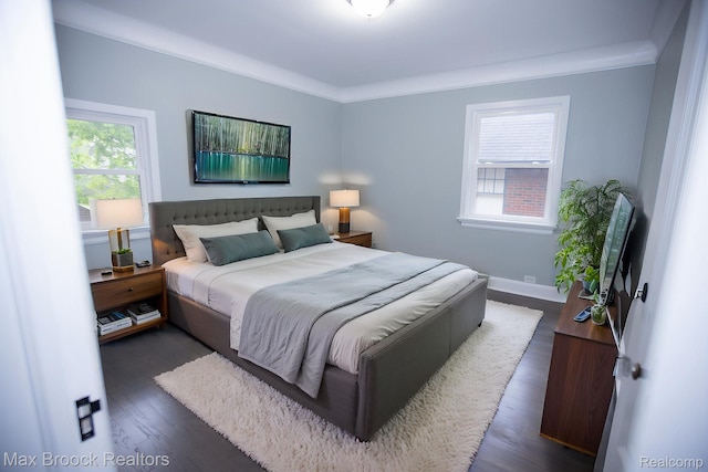 17352 Parkside St, Detroit, MI 48221 - bedroom featuring multiple windows, dark wood-type flooring, and baseboards