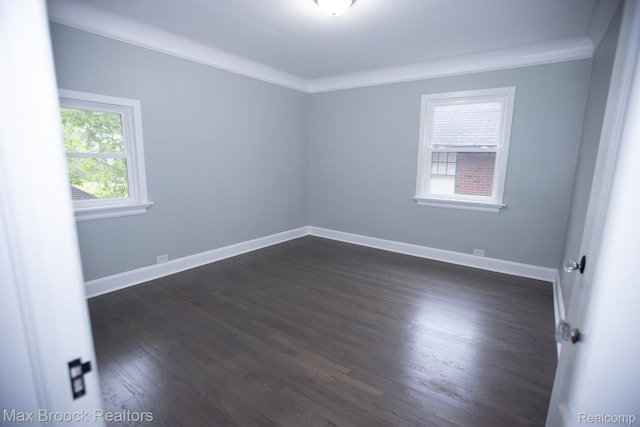17352 Parkside St, Detroit, MI 48221 - spare room with dark wood-type flooring and baseboards