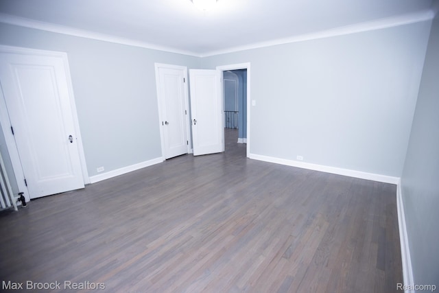 17352 Parkside St, Detroit, MI 48221 - unfurnished room with dark wood-style floors, baseboards, and crown molding