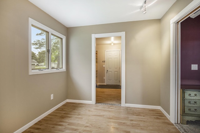8928 Ellis St SE, Alto, MI 49302 - spare room featuring light wood finished floors and baseboards