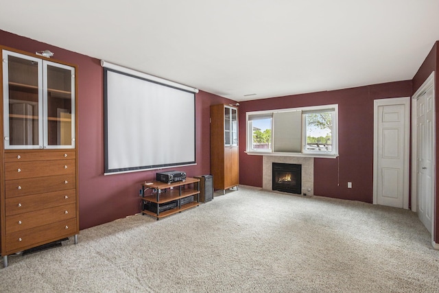 8928 Ellis St SE, Alto, MI 49302 - carpeted living room featuring a fireplace