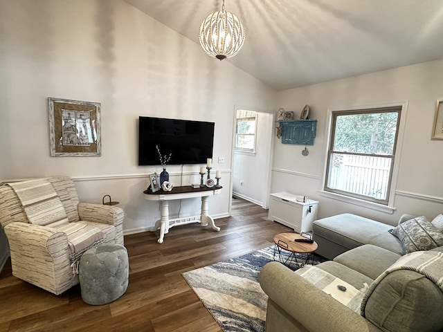 456 E Gull Lake Dr, Augusta, MI 49012 - living room featuring a chandelier, wood finished floors, lofted ceiling, and baseboards