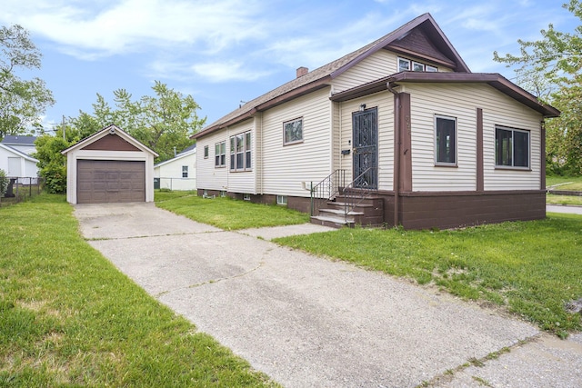 393 Merrill Ave, Muskegon, MI 49441 - view of front of property featuring an outdoor structure, a front yard, a detached garage, and a chimney