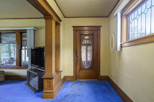 393 Merrill Ave, Muskegon, MI 49441 - entrance foyer featuring carpet flooring, crown molding, baseboards, and decorative columns