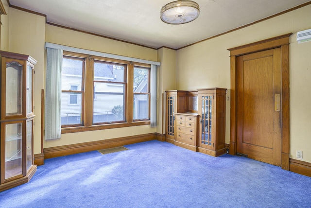 393 Merrill Ave, Muskegon, MI 49441 - unfurnished bedroom featuring carpet flooring, crown molding, and baseboards