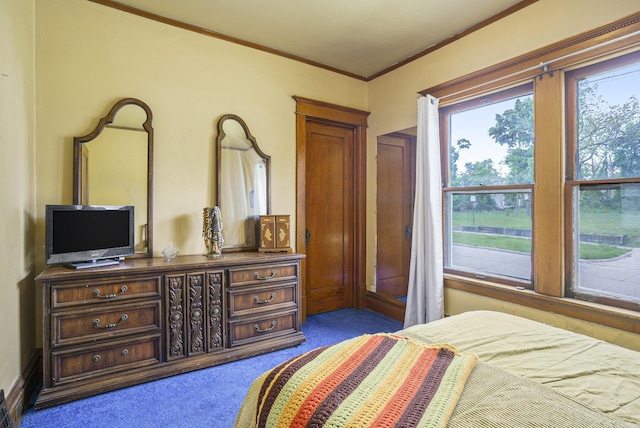 393 Merrill Ave, Muskegon, MI 49441 - carpeted bedroom featuring ornamental molding